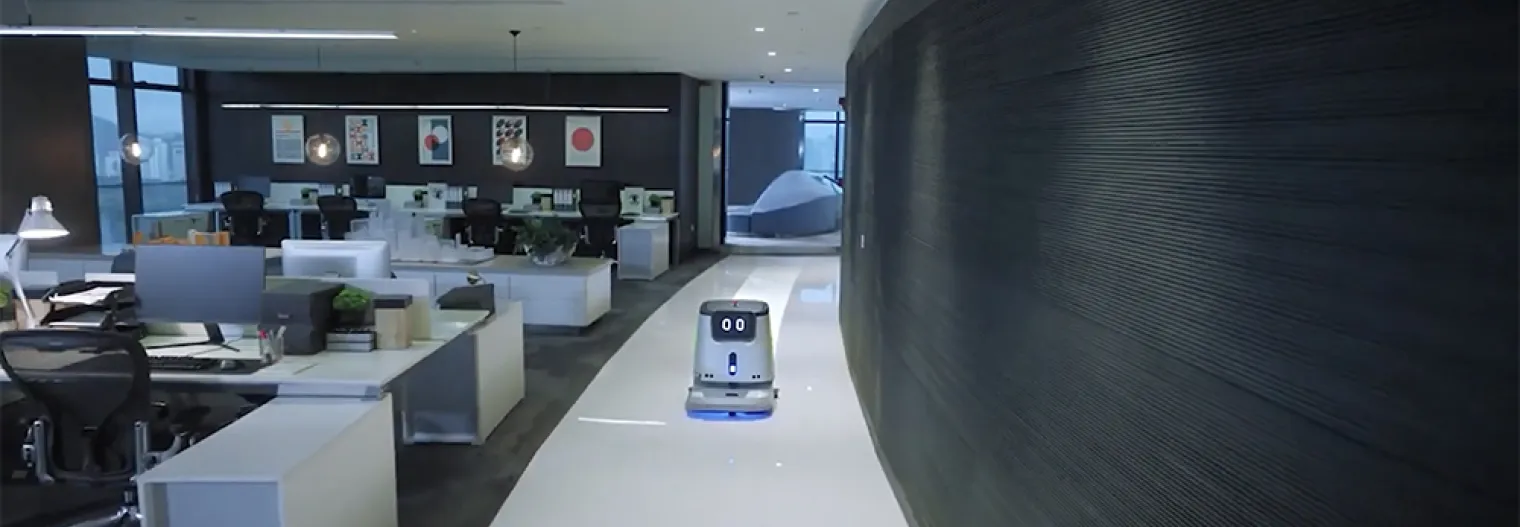 Pudu CC1 Robot limpiando oficina